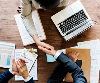 trenmead_business-people-shaking-hands-together
